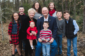 John and Elizabeth Raney with their eight grandchildren